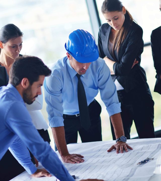 istock_blue-print-meeting-business-people-and-engineers-on-meeting istock_blue-print-meeting-business-people-and-engineers-on-meeting